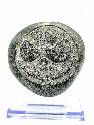 laser engraved river rock jack skellington smiling