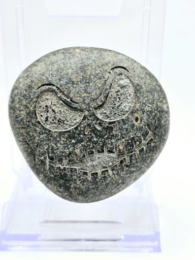 laser engraved river rock jack skellington smiling